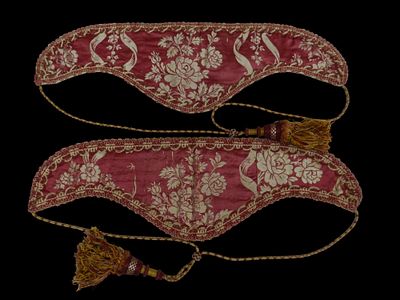 Pair of ruffs. 19th century. A pair of embroidered silk ruffs in shades of maroon and off-white. 