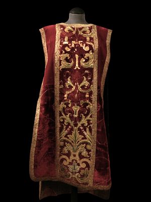 Crimson chasuble. Spain, 16th century. A crimson silk velvet chasuble, embroidered, with two 