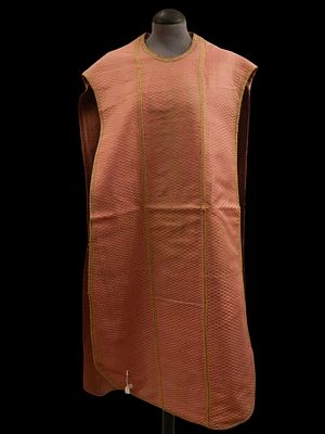 Chasuble c. 1800. A salmon-pink silk-padded chasuble. Circa 1800