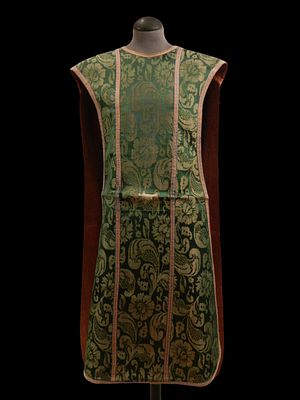 Chasuble. 19th century. A chasuble with a stole and maniple made of light green damask