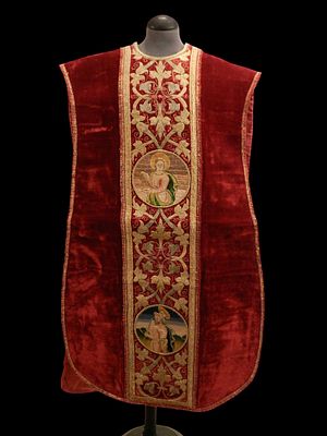Chasuble. Spain, 16th century. Red velvet chasuble with matching bands across the chest and back 