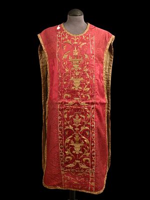 Chasuble Spain, c. 1600. A reddish-coloured chasuble with rich decoration. Spanish work, c. 1600