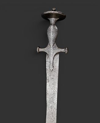 Tulwar sabre. India, 18th century. Dents and wear. 87 cm