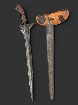 Kris, Indonesia, 19th century. Kris from Indonesia, 19th century. Wooden scabbard lined with 