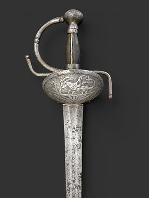 Shell sword. Spain. Spanish shell-hilted sword, with the pommel engraved to form a dragon. The 