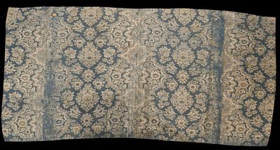 White and blue silk cloth. Date unknown. A cloth made of blue silk, featuring a floral and plant 