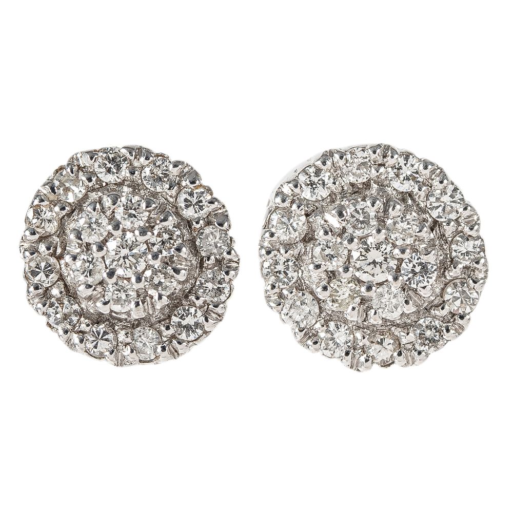 Pendientes en oro blanco con diamantes. Pendientes en oro blanco con roset&oacute;n central y orla de 