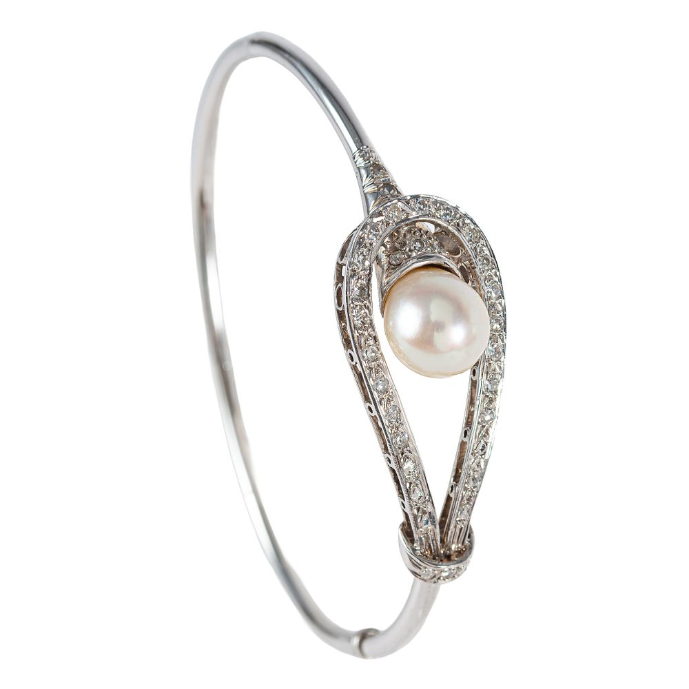 Pulsera esclava en oro blanco con perla cultivada y diamantes. . Pulsera esclava en oro blanco 