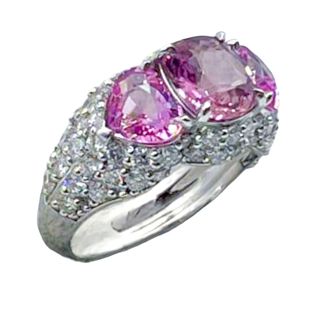 Sortija en oro blanco con zafiros rosas de Ceylán y diamantes. . Sortija en oro blanco con 