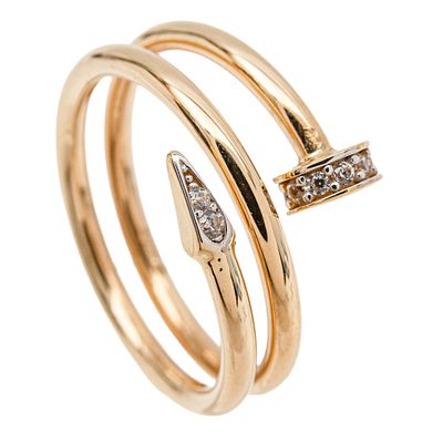 Sortija estilo Cartier en oro y circonitas. . Sortija estilo Cartier en oro con centro cruzado y 