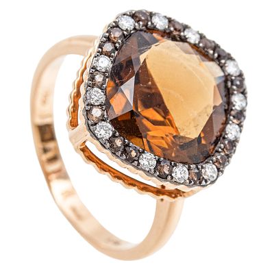 Sortija en oro con topacios fum&eacute; y diamantes. . Sortija en oro con centro y orla de topacios 