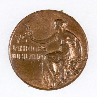 BERLIN JEWISH CLOTHIER "V. MANNHEIMER" ANNIVERSARY COIN. Copper coin created to commemorate the 