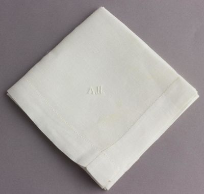 ADOLF HITLER'S LINEN MONOGRAM HANDKERCHIEF. A monogrammed white linen handkerchief once owned by 