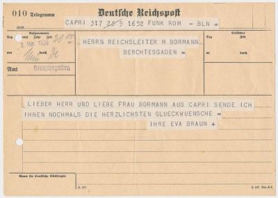 EVA BRAUN TELEGRAM TO MARTIN BORMANN. Martin Bormann's copy of a telegram sent to him By Eva 