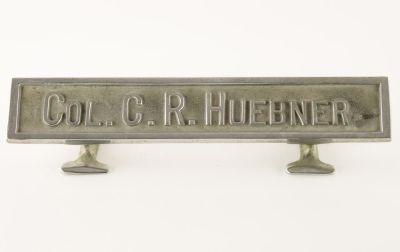 GEN. CLARENCE R. HUEBNER'S WARTIME DESK NAME PLATE. FROM THE ESTATE OF GEN. CLARENCE R. HUEBNER 
