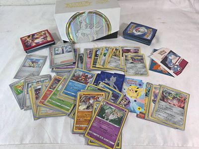 Pokemon Trading Cards. Pokémon trading cards, featuring a variety of card types, including