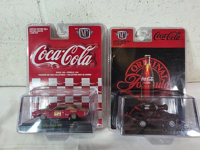 2 Coca-Cola 1:64 Diecast Cars by M2. A 1971 Dodge Charger HEMI and a 1987 Ford Mustang GT
