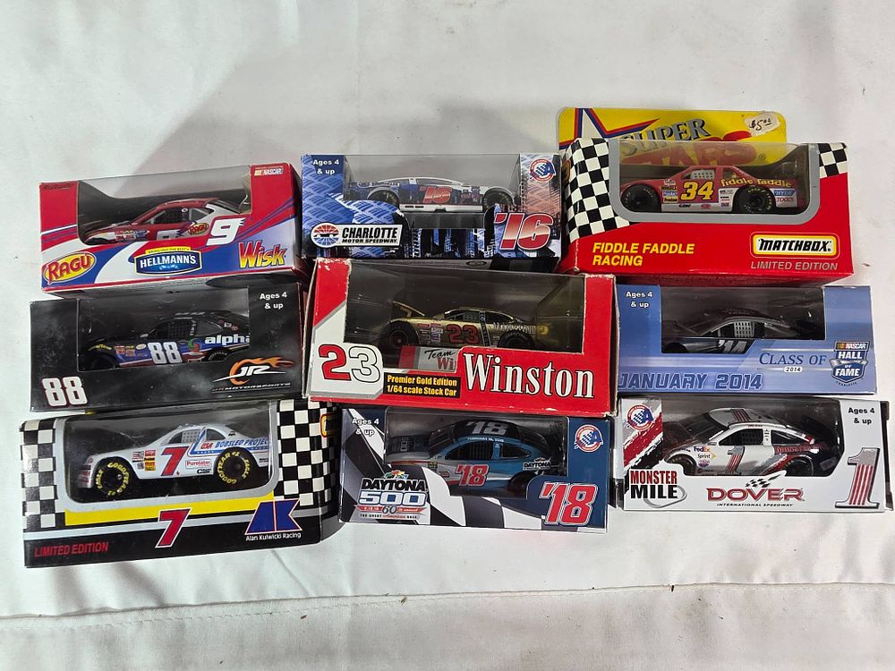 9 NASCAR 1:64 Scale Diecast Cars. Nine NASCAR 1:64 scale diecast cars featuring various iconic 