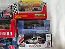 9 NASCAR 1:64 Scale Diecast Cars. Nine NASCAR 1:64 scale diecast cars featuring various iconic Image - 3