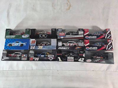 12 NASCAR 1:64 Diecast Cars. 12 NASCAR 1:64 scale diecast cars in original packaging. Includes