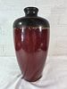 Red and Black Glazed Ceramic Vase. Ceramic vase with a tall, tapered form and a rounded narrow Image - 1