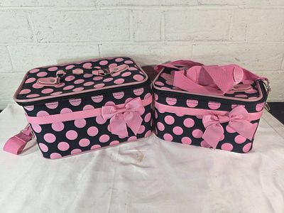 Two-Piece Polka Dot Travel Bags. Two matching travel bags designed for makeup and jewelry
