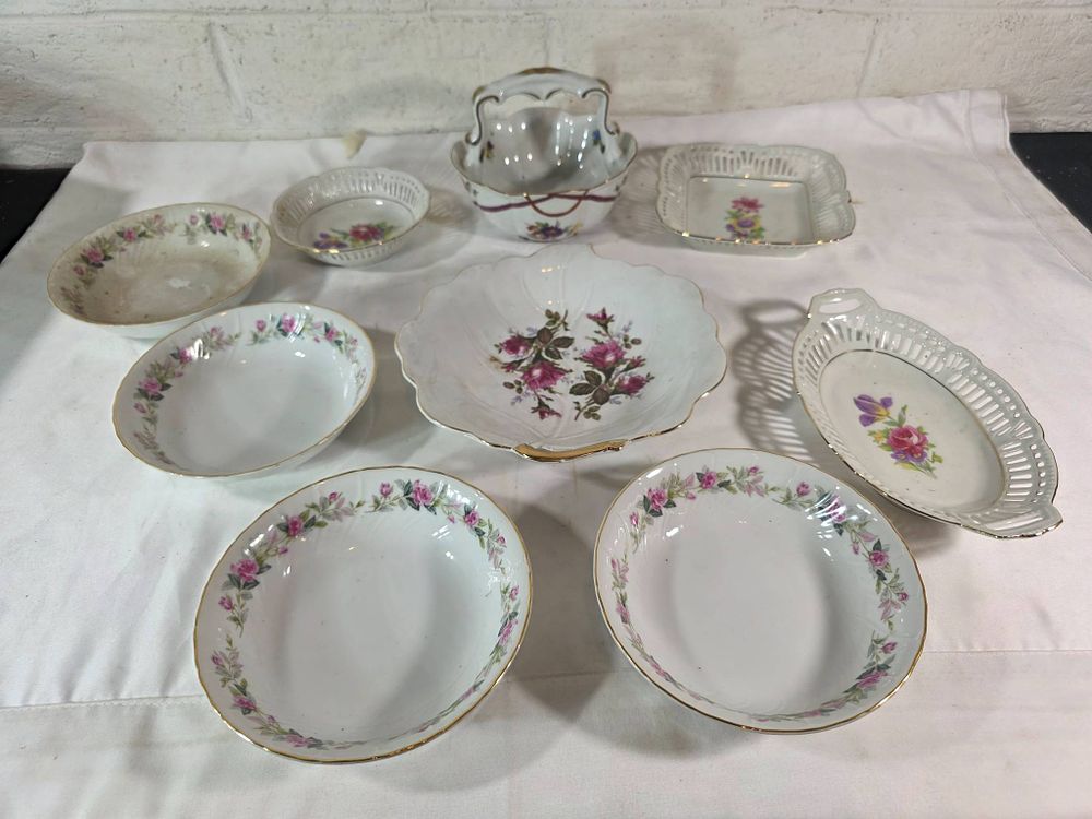 White Glass Serving Dishes with Floral Designs. Eight white glass serving dishes featuring 