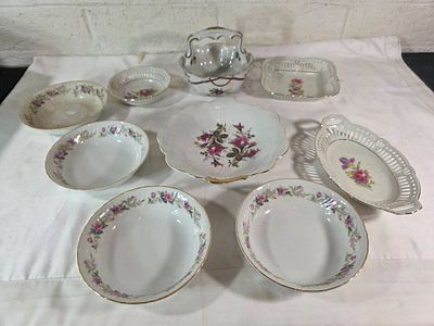 White Glass Serving Dishes with Floral Designs. Eight white glass serving dishes featuring