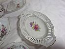 White Glass Serving Dishes with Floral Designs. Eight white glass serving dishes featuring Image - 2