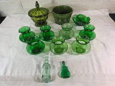 Green Glass Decorative Items. Green glass decorative items, including a lidded candy dish with