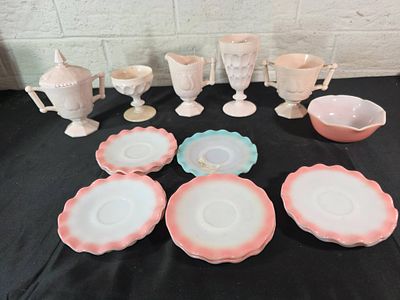Pink Milk Glass Tableware. Pink milk glass items including eight pieces. The set features three