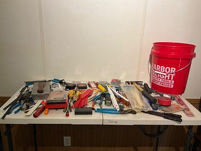 Large Group of Hand ToolsÂ. An assortment of hand tools and accessories, comprising hammers 
