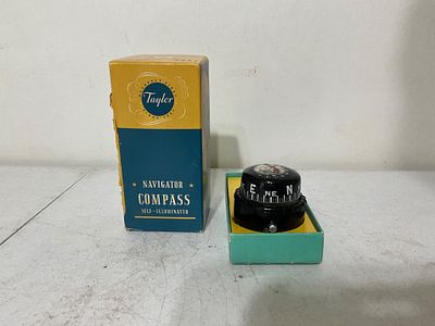 Taylor Navigator Compass for highway or waterway use, featuring a circular black dial with 