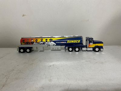 SunocoÂ Tanker Truck. Detailed die-cast model of a Sunoco-branded tanker truck featuring 