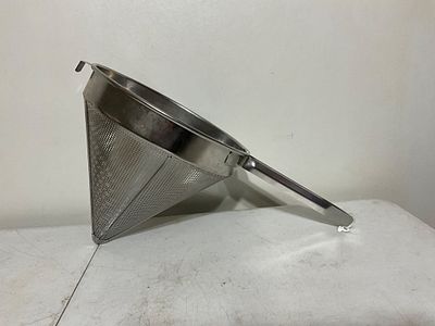 Â Cone-Shaped Strainer. Cone-shaped stainless steel strainer with a perforated mesh body. 