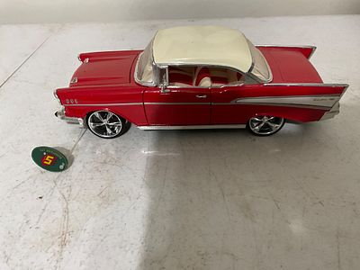 Â 1957 Chevrolet Bel Air. A die-cast model representing a 1957 Chevrolet Bel Air in red with a 