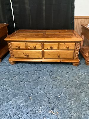 Wood Coffee Table with Storage Drawers. Rectangular wooden coffee table featuring a 