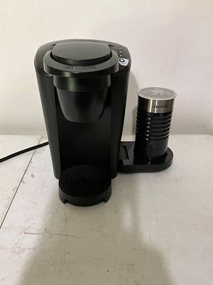 Keurig Single-Serve Coffee Maker with Frother. Keurig single-serve coffee maker in black 