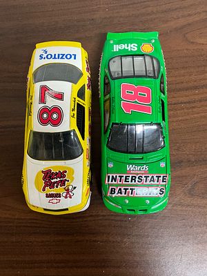 Two NASCAR Model Toy Cars: Texaco & Interstate. Two model toy cars featuring NASCAR-style 