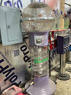 Gumball Wizard Spiral Vending Machine. Gumball Wizard spiral vending machine with an acrylic 