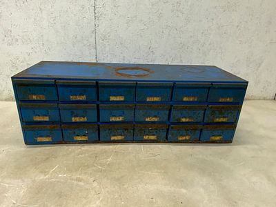 Metal Multi-Drawer Storage Cabinet. Metal storage cabinet featuring 21 individual drawers, each 