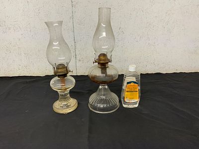 Glass Kerosene Oil Lamps with Fuel. Two glass kerosene oil lamps and a bottle of Ultra-Pure lamp 