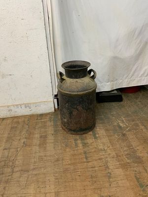 Metal Milk Can with Dual Handles. A vintage-style metal milk can featuring dual side handles and 