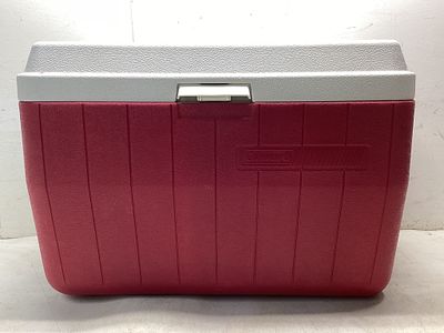Coleman Cooler with Tray and Spigot. Coleman red plastic cooler with a white lid and built-in
