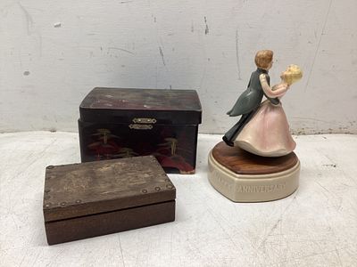 Music Boxes and FigurineÂ. Grouping includes a heart-shaped ceramic music box with a rotating