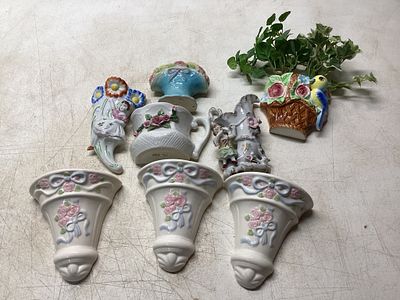 Â Wall Pockets and Decorative Items. Seven decorative ceramic items, including a matching trio