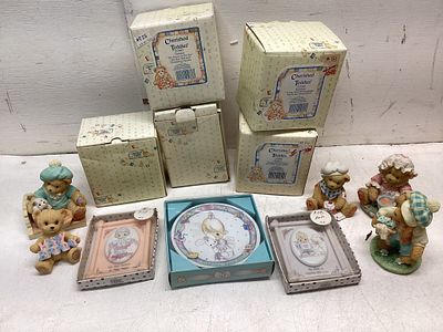 Cherished Teddies Figurines and Plates. Cherished Teddies items, including five boxed figurines