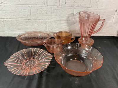 Pink Depression Glass Tableware. Pink Depression glass tableware, including a fluted pitcher, a