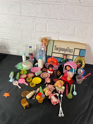 Dolls and Toy Accessories Set. Dolls and toy accessories featuring items such as a doll carriage