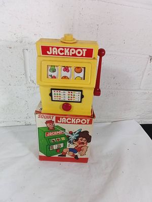 Lot 8 - Plastic Squirt Jackpot Toy with Box | Allens Auctions